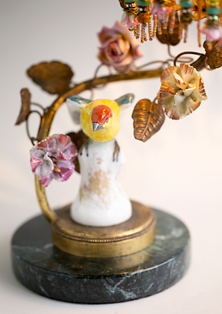 French antique lamp with a bird figurine